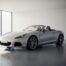 Porsche Boxster S occasion garée dans un garage moderne, vue trois-quarts avant