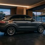 Porsche Cayenne hybride branché à une borne de recharge dans un garage