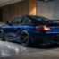 Porsche 996 Turbo S occasion, vue arrière trois-quarts dans un garage
